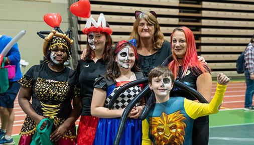 Group in costumes at previous Pumpkin Palooza